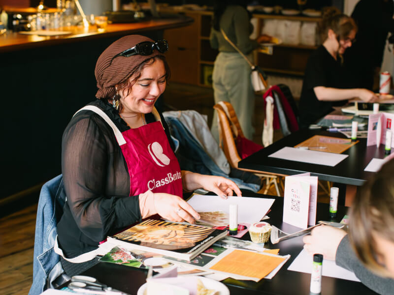 Person smiling at a craft class